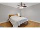 Neutral bedroom features hardwood floors and a ceiling fan at 242 Adair St, Decatur, GA 30030