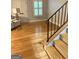 Staircase and entryway area shows hardwood floors and neutral wall color at 242 Adair St, Decatur, GA 30030