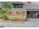 Charming home with brick accents, mature landscaping, and covered parking at 242 Adair St, Decatur, GA 30030