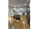 Modern kitchen features a marble island with seating and stainless steel appliances at 242 Adair St, Decatur, GA 30030
