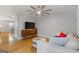 Comfortable living room features hardwood floors and a modern TV at 242 Adair St, Decatur, GA 30030