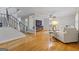 Bright living room features hardwood floors, a cozy fireplace, and a neutral color palette at 242 Adair St, Decatur, GA 30030