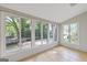 Bright sun room with tile floor and lots of natural light from the many windows at 242 Adair St, Decatur, GA 30030