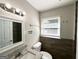 Bathroom featuring granite countertop and wood tile at 1991 Turner Se Rd, Atlanta, GA 30315