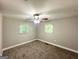 Bedroom featuring neutral carpeting, ceiling fan, and natural light at 1991 Turner Se Rd, Atlanta, GA 30315