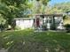 Charming single story home with a well-maintained front yard and inviting red front door at 1991 Turner Se Rd, Atlanta, GA 30315