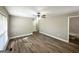 Bright living room featuring sleek hardwood floors and a ceiling fan at 1991 Turner Se Rd, Atlanta, GA 30315