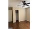 Bright bedroom featuring a ceiling fan and closet for storage at 5225 Silhouette Sw Ln, Mableton, GA 30126