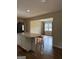 Kitchen view that looks out into the living room with hardwood floors at 5225 Silhouette Sw Ln, Mableton, GA 30126