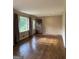Spacious living room boasts hardwood floors and a view of the front yard at 5225 Silhouette Sw Ln, Mableton, GA 30126