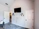 Bedroom with a TV, walk-in closet, and convenient access to other rooms at 125 Kayla Ct, Locust Grove, GA 30248