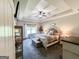 Main bedroom suite with trey ceiling, fan, and lots of natural light from windows at 125 Kayla Ct, Locust Grove, GA 30248