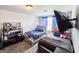 Inviting bedroom with two beds, perfect for a Gathering or guests, with plenty of space at 125 Kayla Ct, Locust Grove, GA 30248