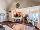 Stylish kitchen with a breakfast bar, granite countertops, stainless steel appliances, and an adjacent dining area at 125 Kayla Ct, Locust Grove, GA 30248