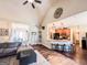 Open-concept living space with bar seating that flows into a cozy living room, creating an inviting atmosphere at 125 Kayla Ct, Locust Grove, GA 30248