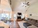 Open concept living room with fireplace, dining area, and view to the kitchen at 125 Kayla Ct, Locust Grove, GA 30248