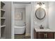 Bathroom with modern soaking tub and vanity at 3119 Conyers Se St, Covington, GA 30014