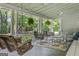 Inviting covered porch with swing and seating offers a serene outdoor living space at 3119 Conyers Se St, Covington, GA 30014