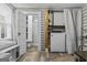 A laundry room featuring a washer, dryer, and access to a bathroom with a shower at 3119 Conyers Se St, Covington, GA 30014