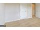 Bedroom featuring neutral carpet and walls showcasing the spaciousness at 91 Jacoby Dr # 103, Fairburn, GA 30213