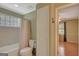 Bathroom featuring a tub-shower combo, and a neutral color scheme at 305 Sherwood Rd, Fayetteville, GA 30215