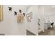 Stylish entryway with coat hooks and interior view showcasing a modern, well-designed transition space at 566 Silver Moon Dr, Loganville, GA 30052