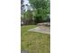 Backyard patio with outdoor furniture and a wooden fence at 6265 Gemstone Ct, South Fulton, GA 30349