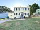 Inviting two-story home with a well-maintained lawn and classic black shutters at 4320 Catalpa Way, Ellenwood, GA 30294