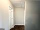 Hallway with neutral colored walls and flooring, connecting the different rooms at 4320 Catalpa Way, Ellenwood, GA 30294