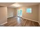 Bedroom with hardwood floors and access to backyard at 2784 Rockdale Dr, Decatur, GA 30034