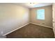 Neutral bedroom with plush carpeting and a bright window with natural light at 2784 Rockdale Dr, Decatur, GA 30034