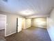 Spacious bedroom with plush carpeting and neutral walls, offering a versatile layout at 2784 Rockdale Dr, Decatur, GA 30034
