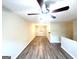 Spacious living room featuring hardwood floors and a ceiling fan at 2784 Rockdale Dr, Decatur, GA 30034