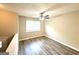 Bright and open living room with ceiling fan and hardwood floors at 2784 Rockdale Dr, Decatur, GA 30034