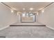 Large finished basement area with neutral carpet, recessed lighting, and open floor plan at 115 Robinwood Ct, Fayetteville, GA 30214