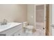 Bathroom featuring tiled floors, a white vanity, a toilet and a shower-tub combo at 115 Robinwood Ct, Fayetteville, GA 30214