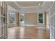 Bright living room features hardwood floors, recessed lighting and large windows at 115 Robinwood Ct, Fayetteville, GA 30214