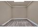 This room features neutral carpeting and paint, and white trim at 115 Robinwood Ct, Fayetteville, GA 30214