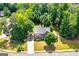 A birds eye view of a well maintained house with mature trees and landscaping at 1120 Bagwell Dr, Kennesaw, GA 30152