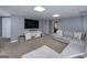Cozy finished basement features a comfortable seating area and television for relaxation and entertainment at 1120 Bagwell Dr, Kennesaw, GA 30152