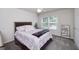 Comfortable bedroom featuring a bed and natural light at 1120 Bagwell Dr, Kennesaw, GA 30152