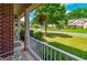Inviting front porch view overlooking the manicured lawn and neighborhood at 1120 Bagwell Dr, Kennesaw, GA 30152