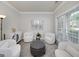 Cozy living room with plush seating, soft natural light, and neutral decor at 1120 Bagwell Dr, Kennesaw, GA 30152