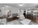 Open concept living room with stylish furnishings, hardwood floors, and plenty of natural light at 1120 Bagwell Dr, Kennesaw, GA 30152