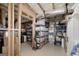 Unfinished storage room with storage shelves and visible insulation at 1120 Bagwell Dr, Kennesaw, GA 30152