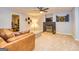 Cozy living room features a fireplace, leather couch, and interesting decor at 306 Sandalin Ln, Peachtree City, GA 30269