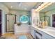 Main bathroom boasts a glass shower, separate tub, and double sink vanity at 306 Sandalin Ln, Peachtree City, GA 30269