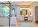 Main bathroom boasts a glass shower, separate tub, and double sink vanity at 306 Sandalin Ln, Peachtree City, GA 30269
