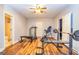 Workout room with weightlifting equipment and access to a full bathroom at 306 Sandalin Ln, Peachtree City, GA 30269