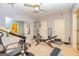 Workout room with mirrors and weightlifting equipment at 306 Sandalin Ln, Peachtree City, GA 30269